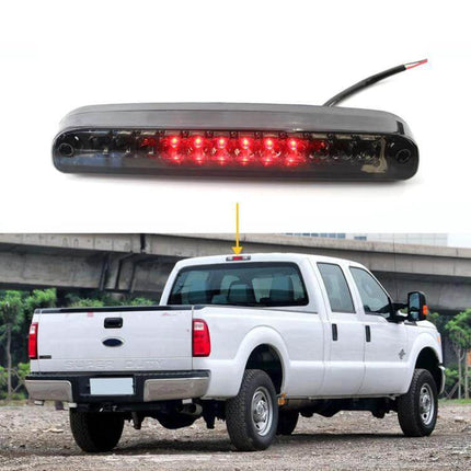 LED High Mount Brake Light for Ford F-Series Super Duty bright red LED high mount brake light installed on white Super Duty truck