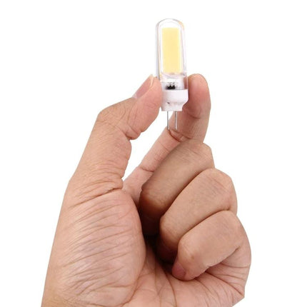 Versatile Dimmable Bulb for Everyday Home and Office Lighting - hand holding small dimmable LED bulb for adjustable home and office lighting