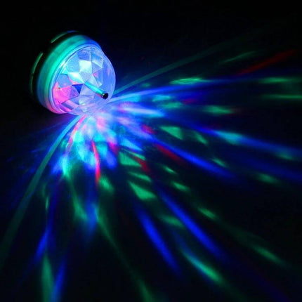 Led Full Color Auto Rotating Lamp For Parties At Home projecting vibrant RGB beams across a dark room