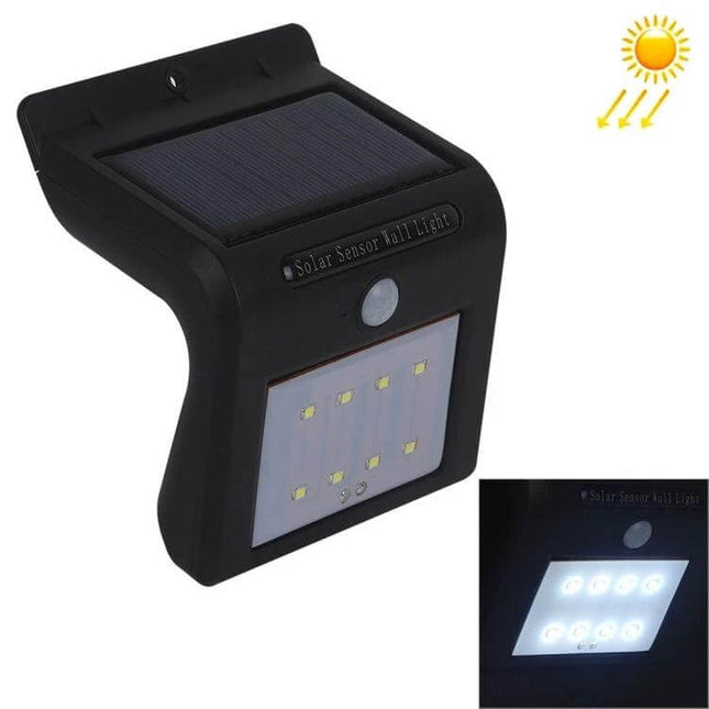 Solar Motion Sensor Wall Light For Outdoors With 8 LEDs mounted on exterior wall showing solar panel, motion sensor and illuminated 8-LED panel