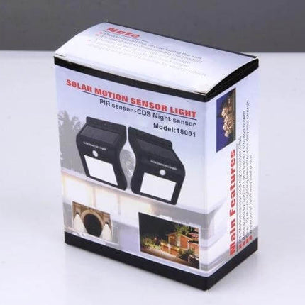 Solar Motion Sensor Wall Light For Outdoors With 8 LEDs box packaging showing product images and features