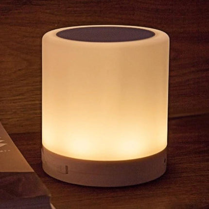 Versatile Speaker for Everyday Music and Travel Moments glowing portable lamp-style speaker with handle-free compact design for commute calls