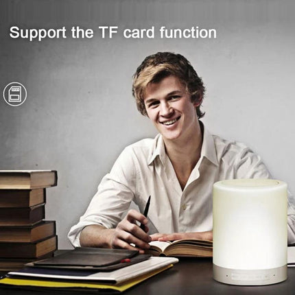 Versatile Speaker for Everyday Music and Travel Moments — portable lamp-style speaker with TF card, hands-free calls and handle, shown on desk with student