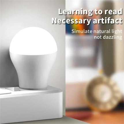 Compact USB LED Light for Evening Reading at Home showing small plug-in LED lamp on bedside charger providing soft, natural reading light