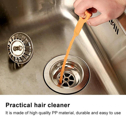 A Practical Gadget for Daily Household Drain Maintenance - orange hair and debris remover tool used in sink drain for quick routine cleaning