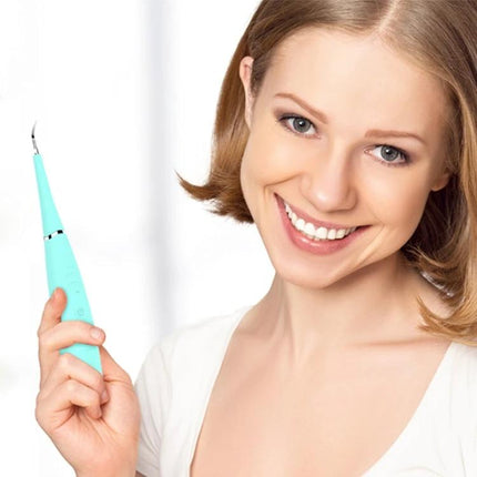 Alt Tag: LSHOW Teeth Polisher With Five Speed USB Charging For Home Use compact ultrasonic cleaner held by smiling woman, IPX6 waterproof