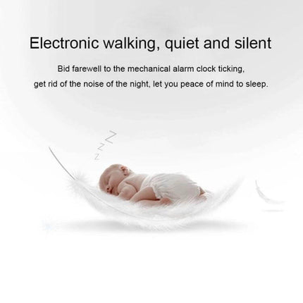 Large Screen LED Music Alarm Clock With Temperature Display showing quiet electronic movement, sleeping baby image to emphasize silent, soothing bedroom use