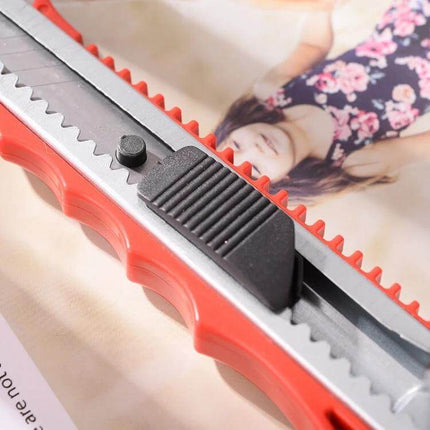 Large Size Utility Knife For Paper Cutting At Home And Office stainless steel blade with red plastic handle close-up, 150 mm length