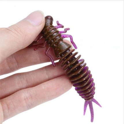 Larvae Silicone Soft Bait Lure 10 cm For Pond And River Fishing — brown-purple lifelike silicone larvae held between fingers for pond and river fishing