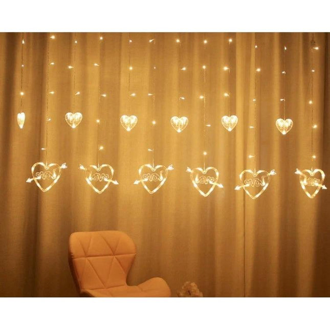 LED Heart-Shaped Curtain Lights Warm White EU Plug hanging warm-white heart curtain lights over chair, layered 2.5m main line with 80cm and 60cm drops
