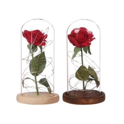 LED Light Rose With Glass Dome For Romantic Home Decor - red rose under clear glass dome on wooden base with warm LED string lights