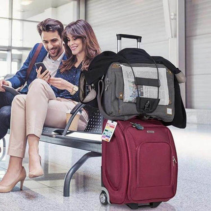 Lever Box Packing Belt For Luggage, Adjustable Strap securing travel bags and stabilizing luggage on a red rolling suitcase