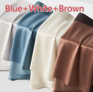 Alt Tag: Light-Luxury Satin Silk Antibacterial Men's Boxer Briefs Moonlight Blue displayed satin fabric swatches in blue white and brown showing smooth finish and seamless design