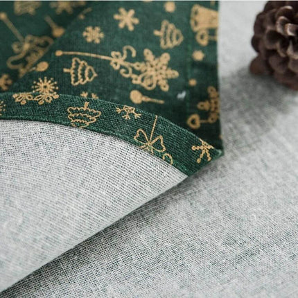Linen Cotton Christmas Tablecloth Rectangular 140x300 cm green printed linen-cotton corner close-up with gold holiday motifs and grey underside