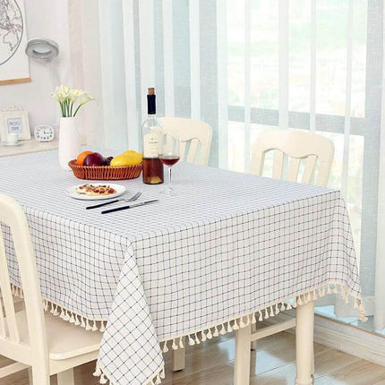 Linen Dining Tablecloth 120x160cm for Home Dining Use on a light checkered rectangular table with fruit bowl and wine