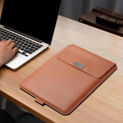 Versatile PU Leather Laptop Bag Set for 15-Inch Laptops with Organizer on desk next to laptop, tan sleeve with organizer pocket