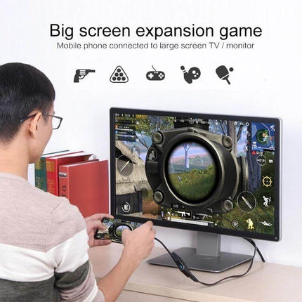 USB-C Multi-Port Adapter for HDMI, VGA, and Device Connections showing laptop/phone connected to monitor for big-screen gaming and peripherals