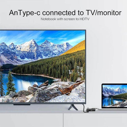 USB-C Multi-Port Adapter for HDMI, VGA, and Device Connections connecting a laptop to an HDTV and monitor for presentations and peripherals