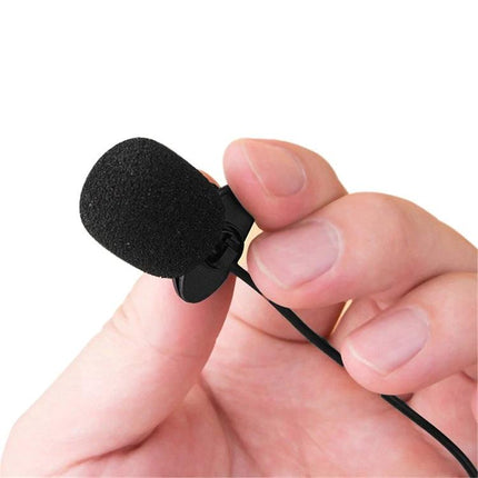 Lavalier Microphone for Daily Lectures and Meetings - close-up of clip-on omnidirectional lavalier microphone with foam windscreen held between fingers