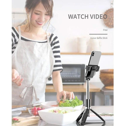 Selfie Stick for Capturing Daily Moments and Travel Memories held as tripod in kitchen for hands-free cooking videos and steady phone shots