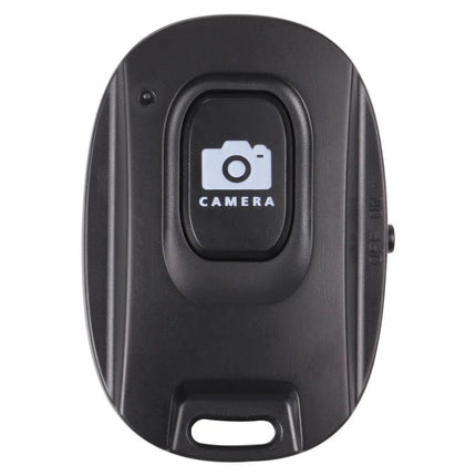 Compact Wireless Bluetooth One-Button Selfie Remote for Smartphones — black compact remote with camera icon button for hands-free photos