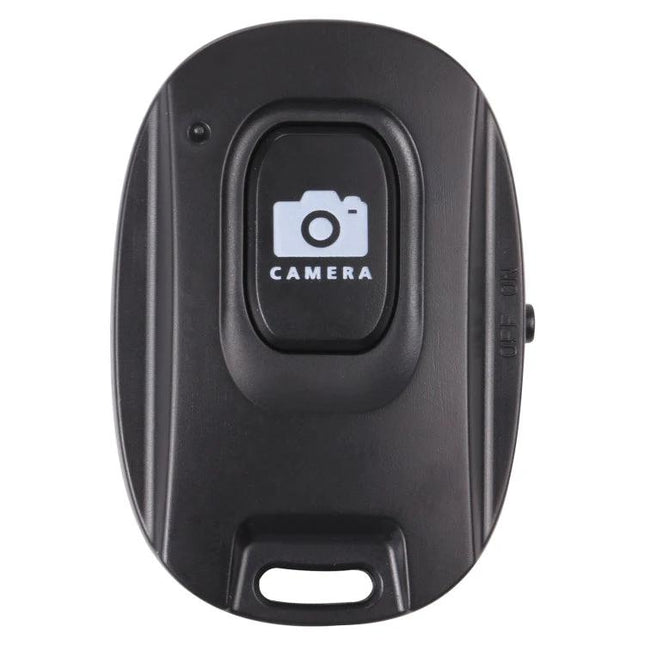 Compact Wireless Bluetooth One-Button Selfie Remote for Smartphones — black compact remote with camera icon button for hands-free photos