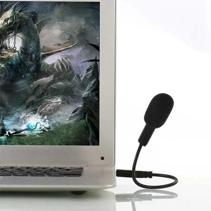 Yanmai Microphone for Home Recording and Daily Chats USB omnidirectional mic plugged into laptop for clear desk recordings and online chats