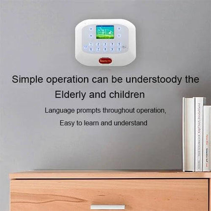 Wireless GSM Home Security Alarm System with Touch Panel mounted on wall above dresser demonstrating simple operation and bookshelf