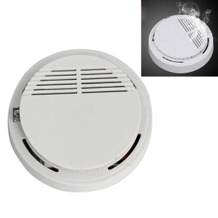 First Alert Battery-Operated Smoke Alarm for Home Safety white ceiling smoke detector showing vents and alarm indicator