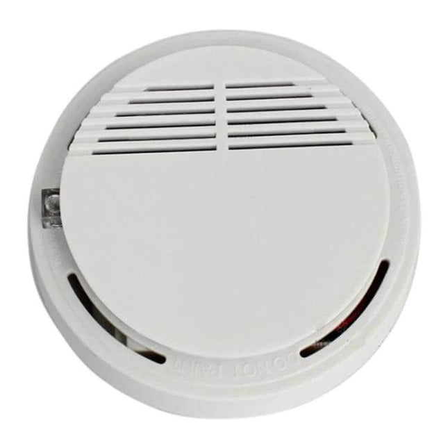First Alert Battery-Operated Smoke Alarm for Home Safety — white round smoke detector with vents and LED indicator, wall/ceiling mountable