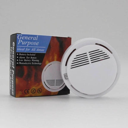First Alert Battery-Operated Smoke Alarm for Home Safety - compact white smoke detector with packaging for bedroom hallway kitchen