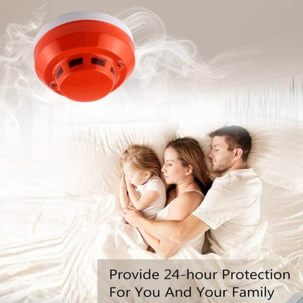 Photoelectric Smoke Detector for Home Fire Safety with Red Indicator mounted above sleeping family, red LED alert, covers up to 80 m²