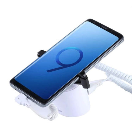 Cylindrical Display Stand with Anti-Theft Alarm for Mobile Phones showcasing a smartphone with coiled alarm cables