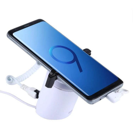 Cylindrical Display Stand with Anti-Theft Alarm for Mobile Phones showcasing a smartphone on white security base