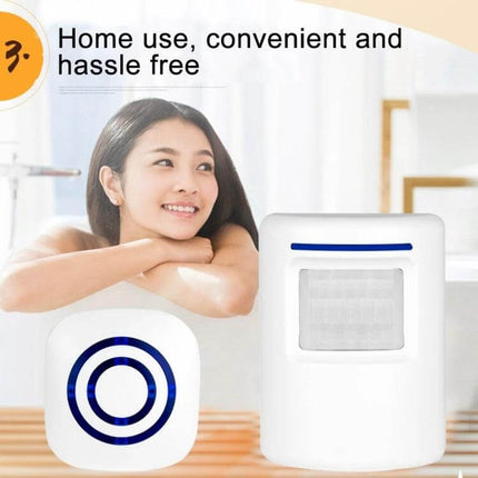 Wireless PIR Infrared Doorbell Alarm Detector for Home and Office showing indoor PIR sensor and wireless chime near a smiling woman