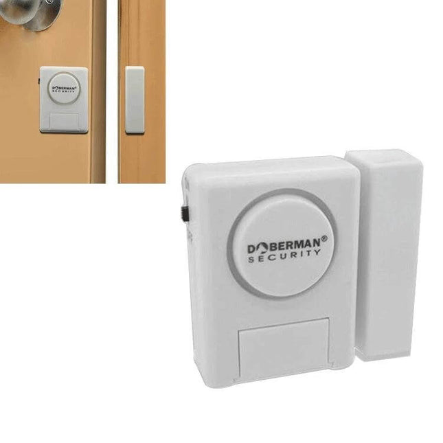 Doberman Wireless Remote Control Door Alarm for Home Security mounted on door showing alarm unit and magnetic sensor