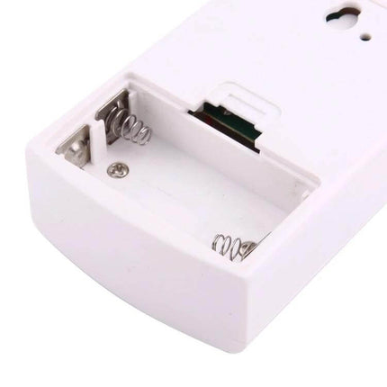 Aiton Wireless Music Doorbell with Multiple Ringtones for Home battery compartment close-up showing spring terminals and mounting slot