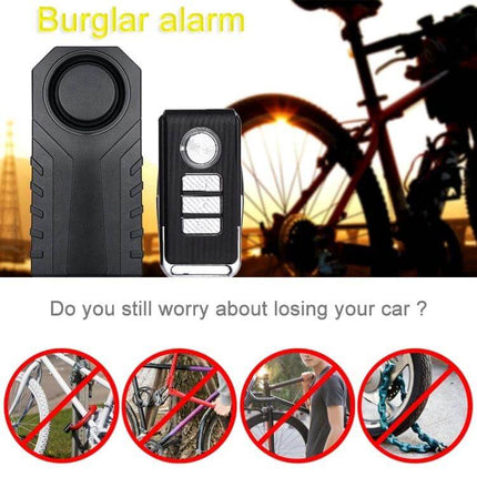 Waterproof Wireless Vibration Alarm for Bicycle Security mounted on bike frame at sunset to prevent theft, waterproof wireless vibration alarm device