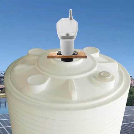 Ultrasonic Liquid Level Meter for Water Tank Monitoring mounted on top of a white plastic water tank for accurate non-contact level sensing