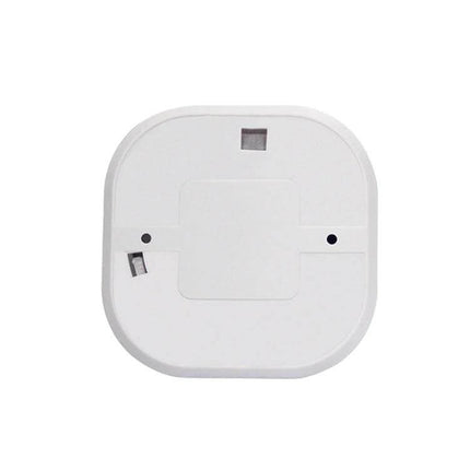 Wireless Smart Smoke Alarm with Voice Alerts for Home Safety white square smoke detector top view, voice alert speaker and sensor ports