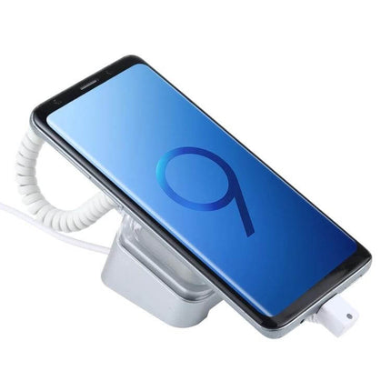 Anti-Theft Display Stand for Mobile Phones with Remote Control and Type-C Compatibility showing a secured smartphone on display