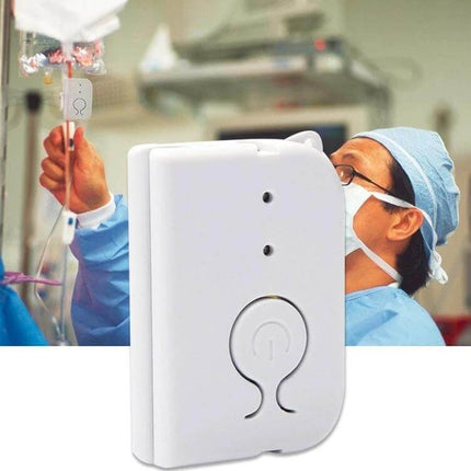Hospital Infusion Reminder Alarm Sensor for Patient Monitoring white bedside IV sensor alert device used by nurse in hospital to detect infusion completion