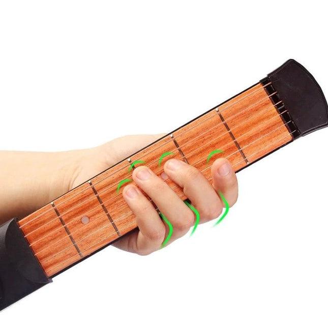 Essential Pocket Guitar Tool for Daily Practice Sessions - hand demonstrating chord positions on compact practice device