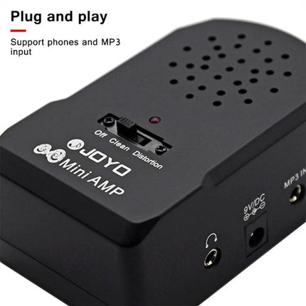 JOYO Compact Amplifier for Everyday Guitar Practice On the Go close-up of black mini amp with switch, speaker grille and headphone/MP3 input