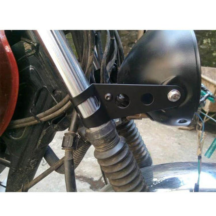Adjustable Motorcycle Headlight Holder for Motorcycle Sizes mounted on fork with sturdy metal bracket reducing vibration and improving visibility