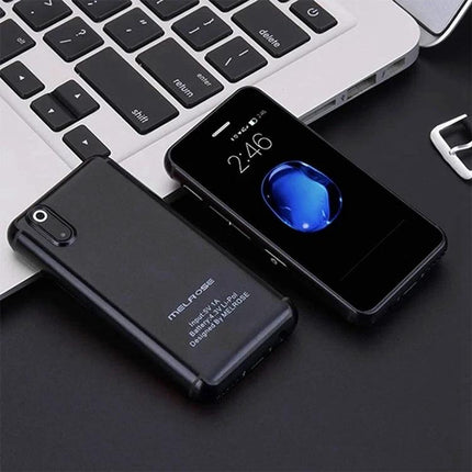 Versatile Android Smartphone for Everyday Communication and Internet Access shown next to laptop, compact black handset for calls, texting, browsing and GPS navigation