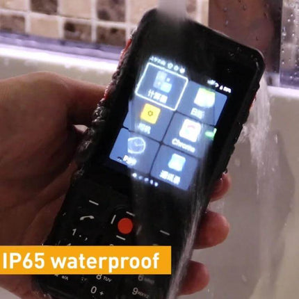 Rugged Waterproof Android Device for Outdoor Communication held under running water demonstrating IP65 waterproof durability