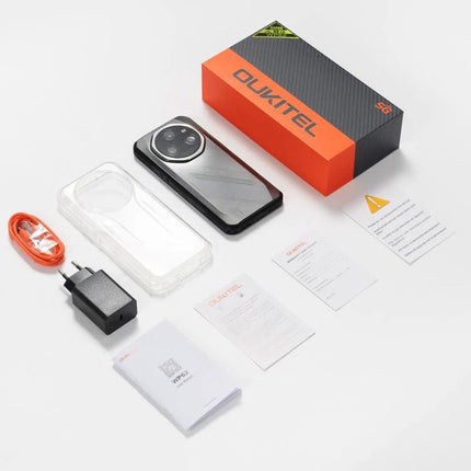 Oukitel Rugged Phone for Everyday Outdoor Activities unboxed with charger, USB cable, case, manuals and packaging