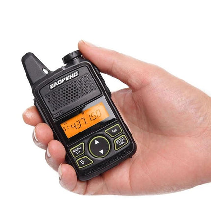 BaoFeng Portable Handheld Walkie Talkie for Everyday Use with UK Plug showing compact black unit in hand with illuminated display