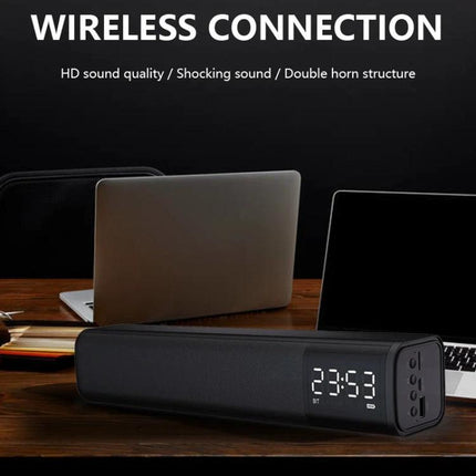 Compact Bluetooth Speaker For Home Listening With Mic shown on desk with laptop, clock display, wireless connection, TWS support